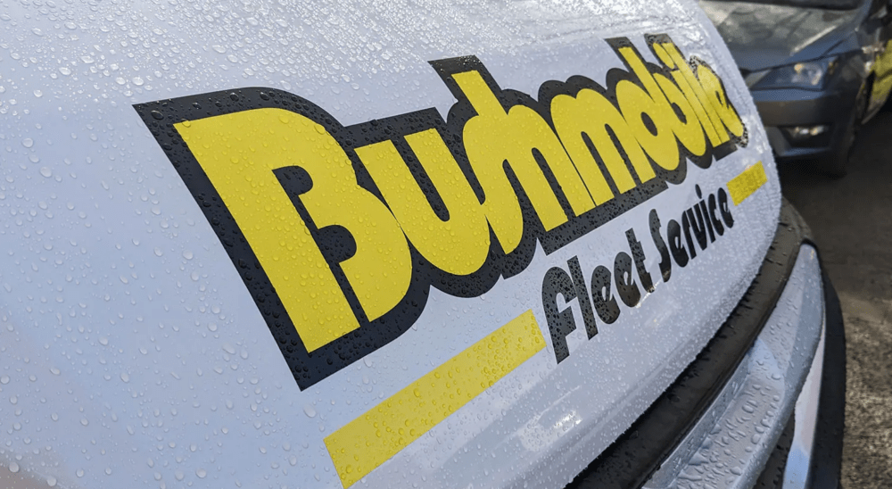 Bush tyres van front with their logo