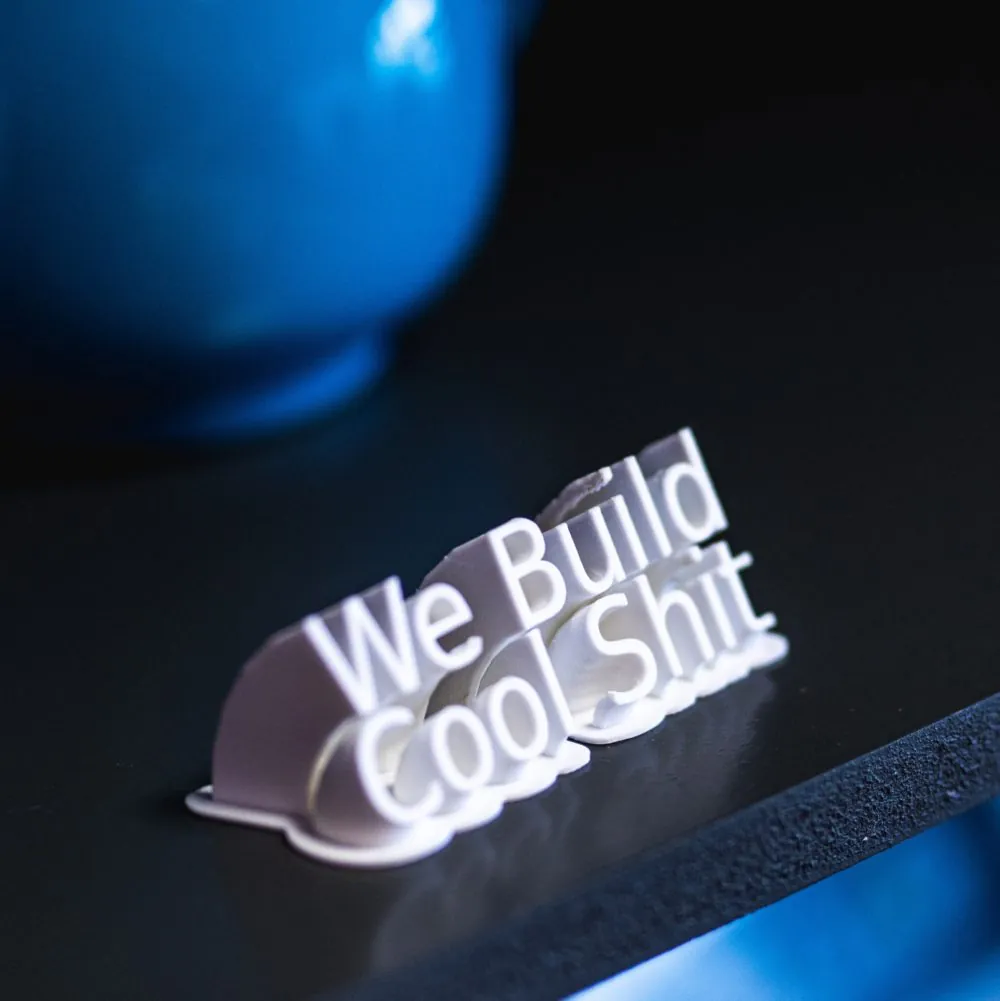 a 3d printed sign that reads