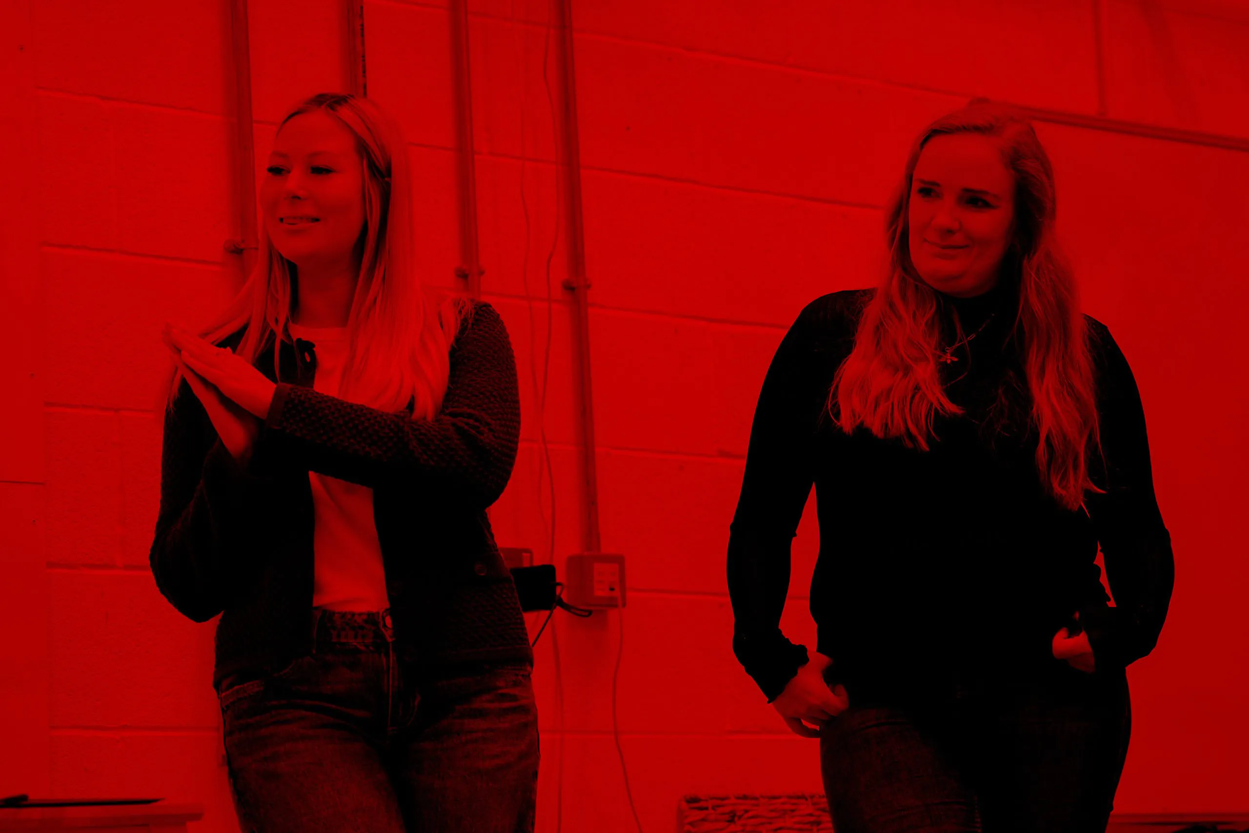 Becca and Steph stood up presenting