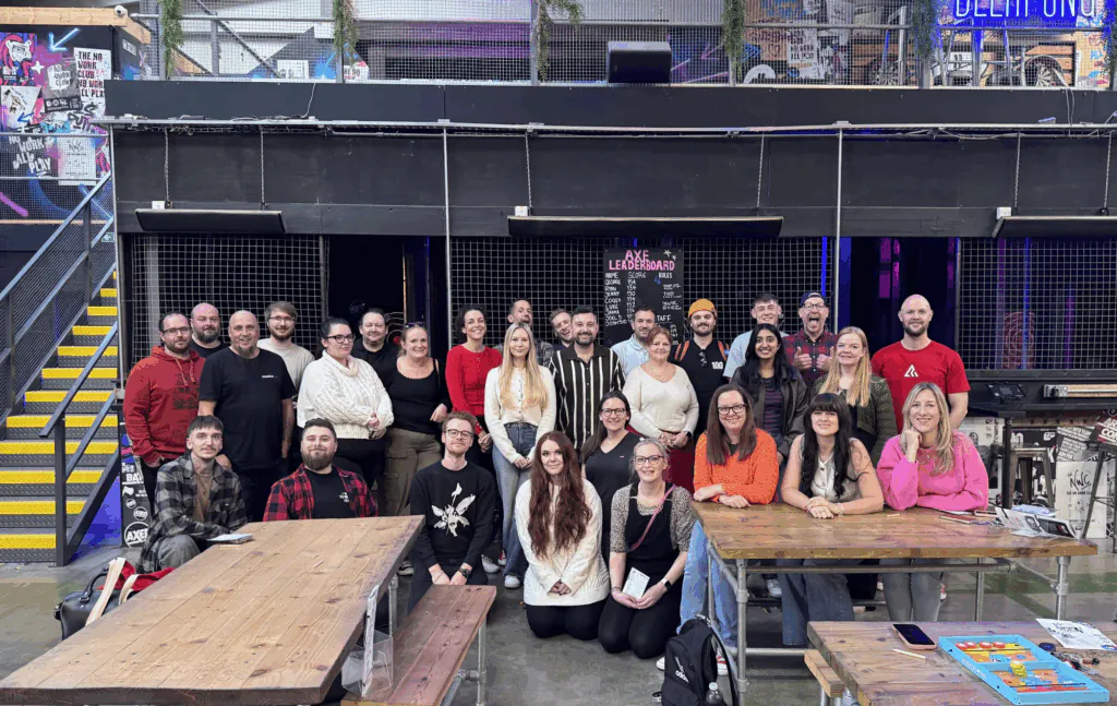 The whole team enjoying crazy golf