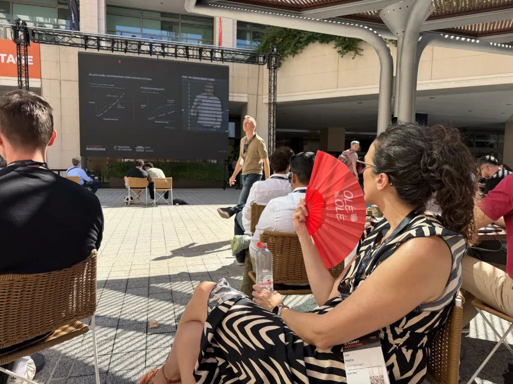 Lisa at the event outside fanning herself